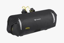 Side profile of the 9L Expedition Handlebar Pack, demonstrating compact form and secure mounting for smaller load carrying.